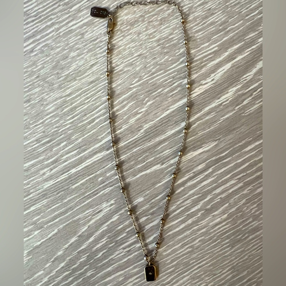 Elegant Gold and Silver Necklace
